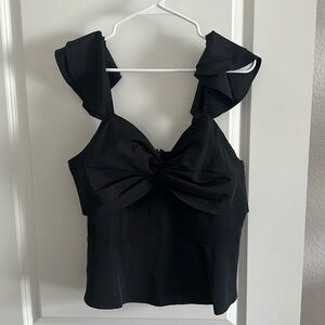 Brand new with tags! Express. Black top with flutter sleeves! Size large